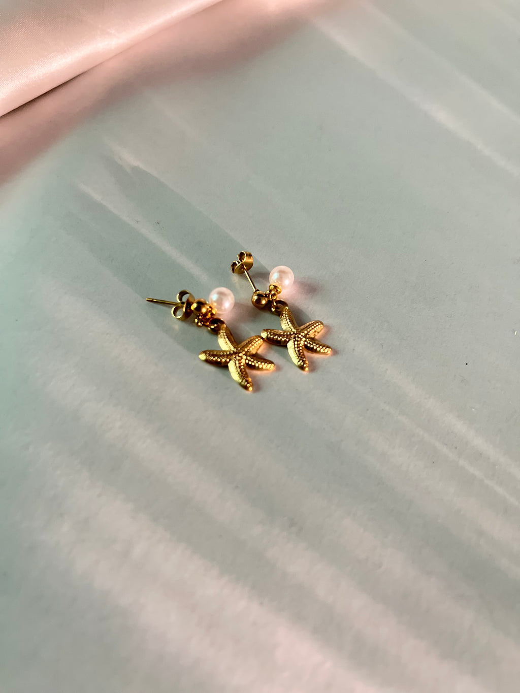 Dainty star and pearl earrings