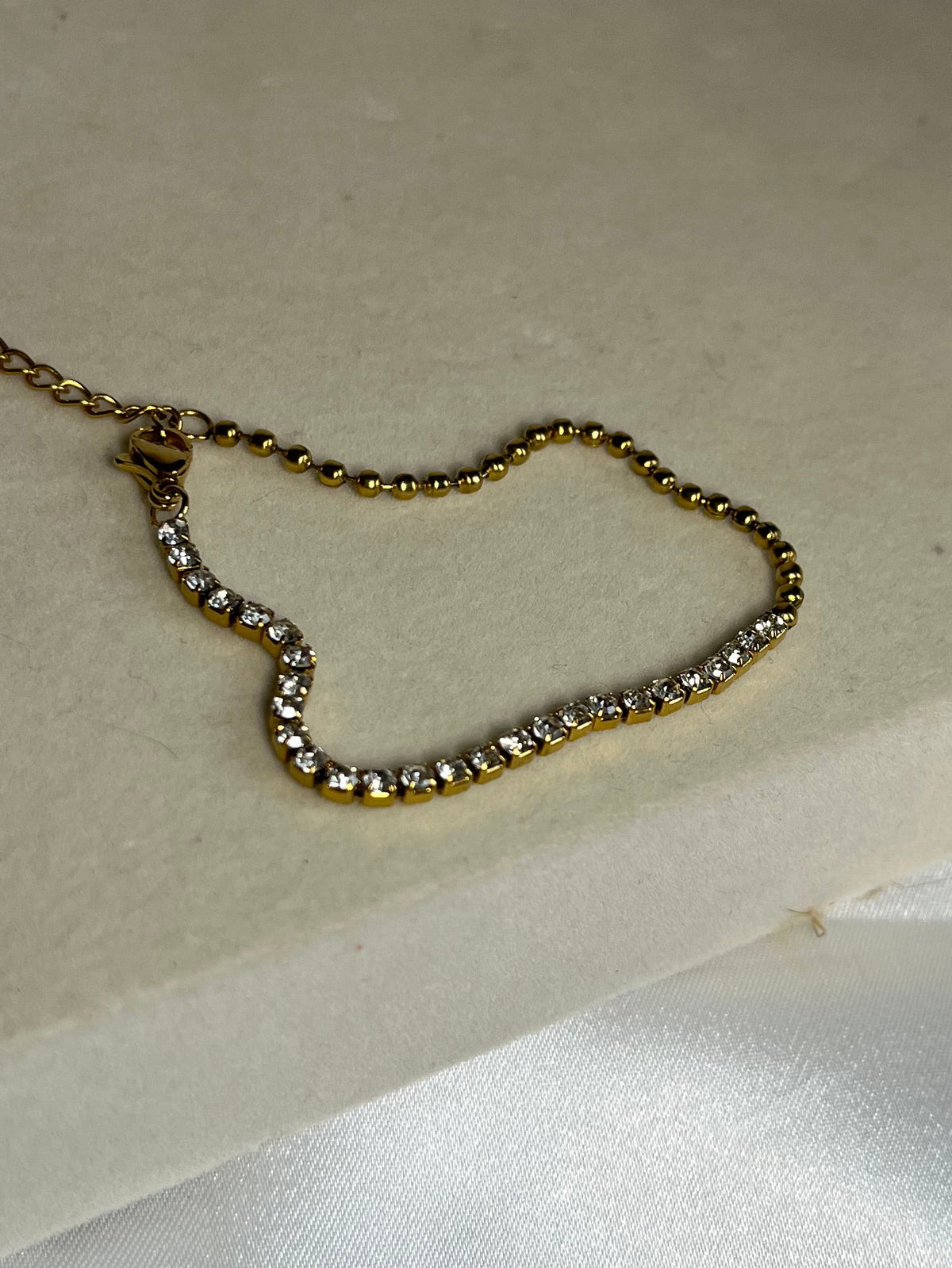 Gold half tennis bracelet