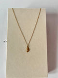Trishya sea shell pendant