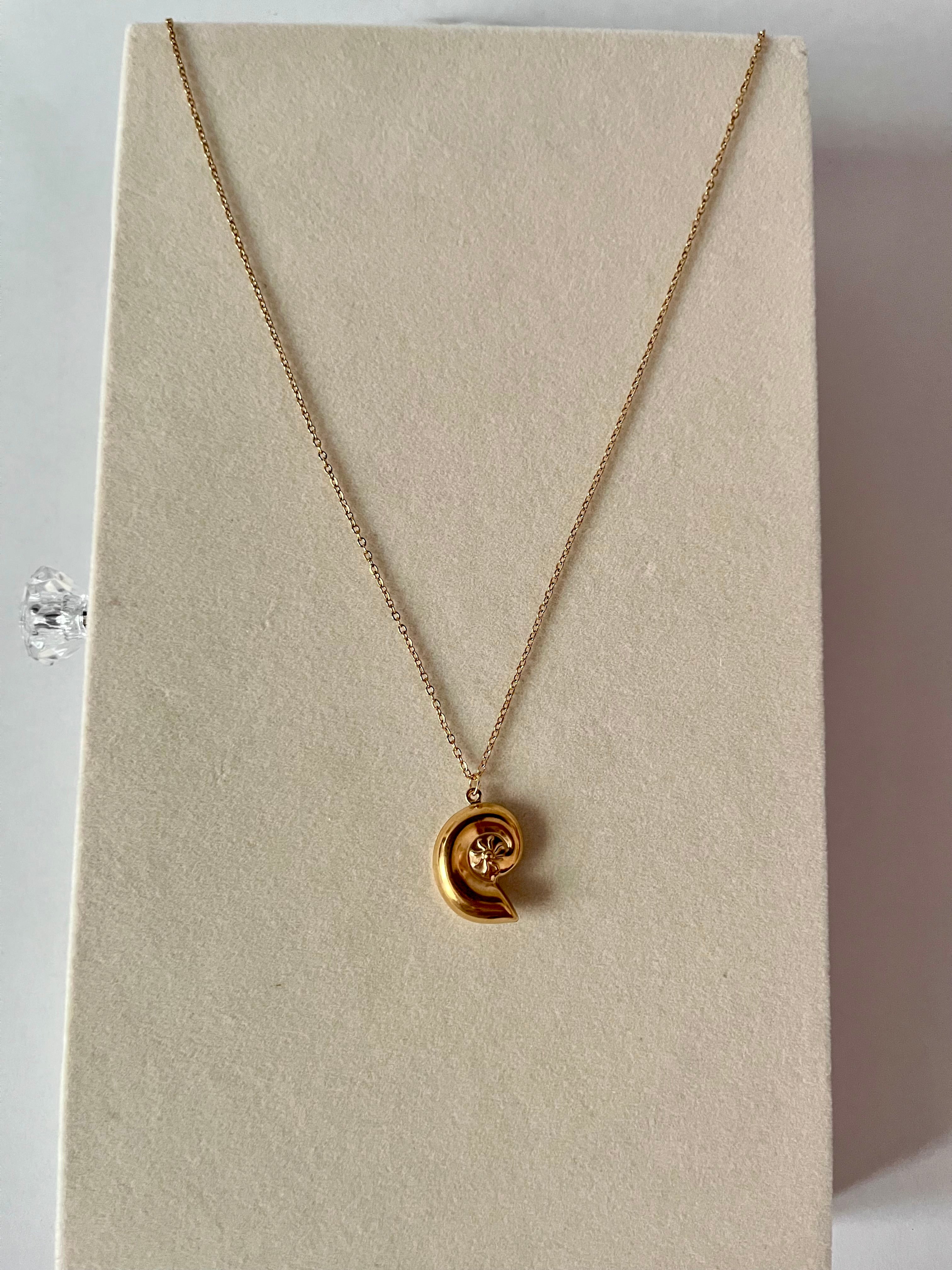 Trishya snail pendant