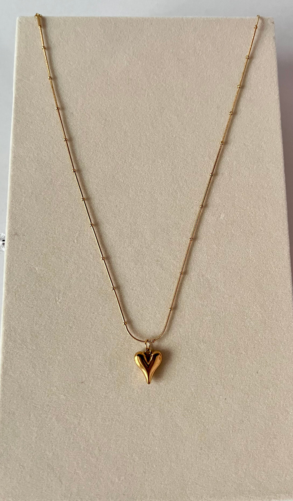 Trishya golden heart drop necklace