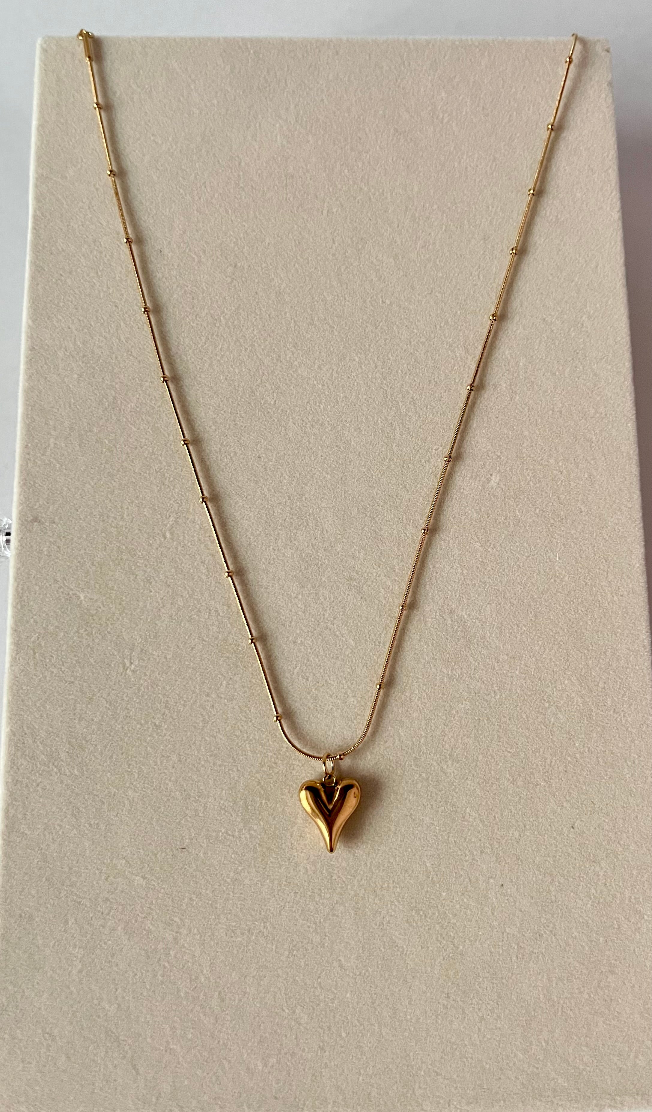 Trishya golden heart drop necklace