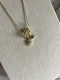 Evil eye & swan charms