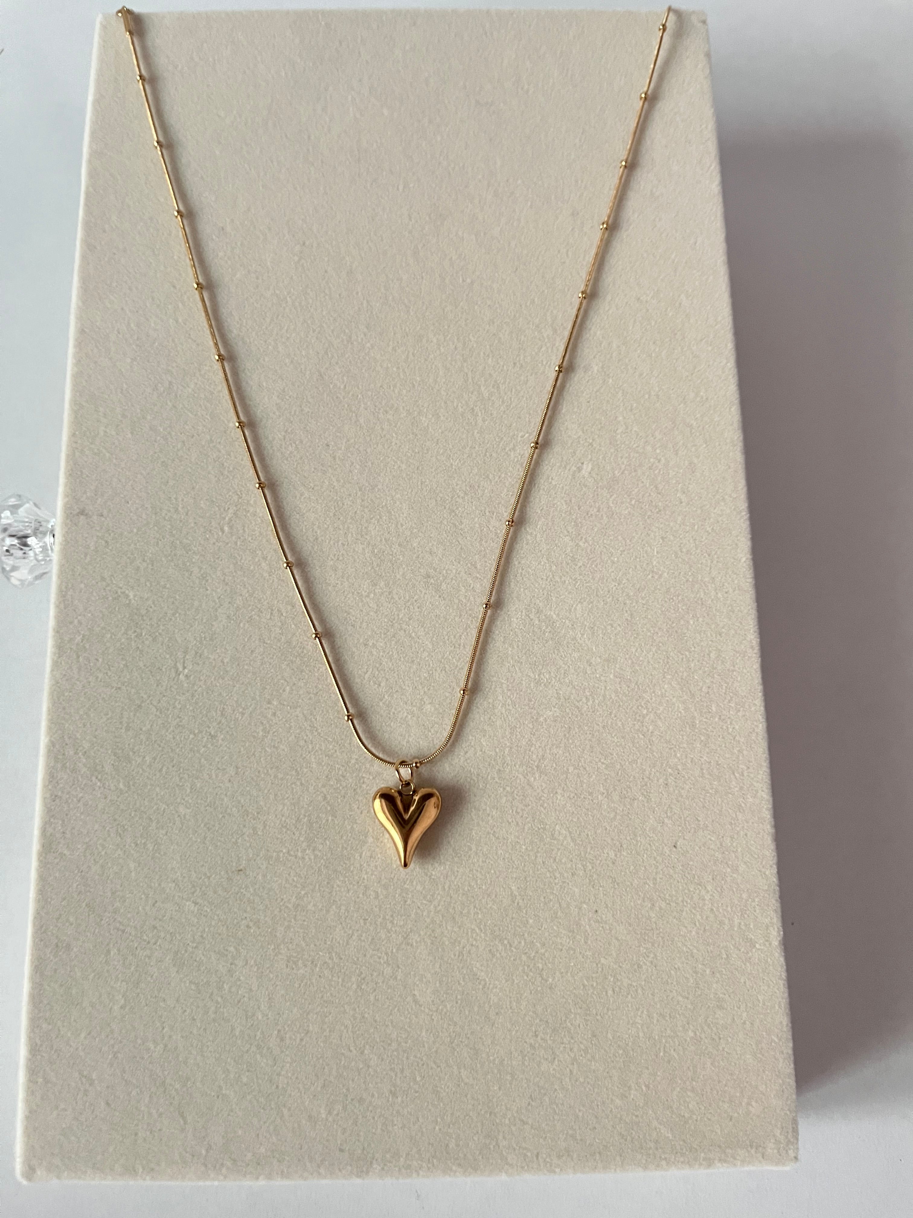 Trishya golden heart drop necklace